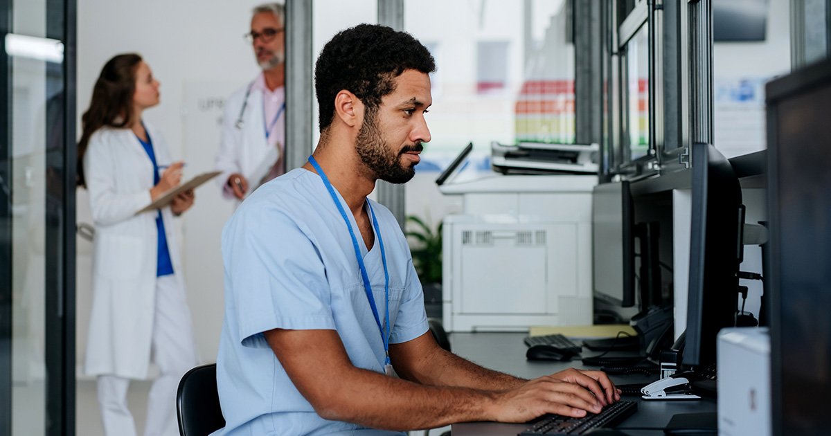 provider entering data into computer provider entering data into computer
